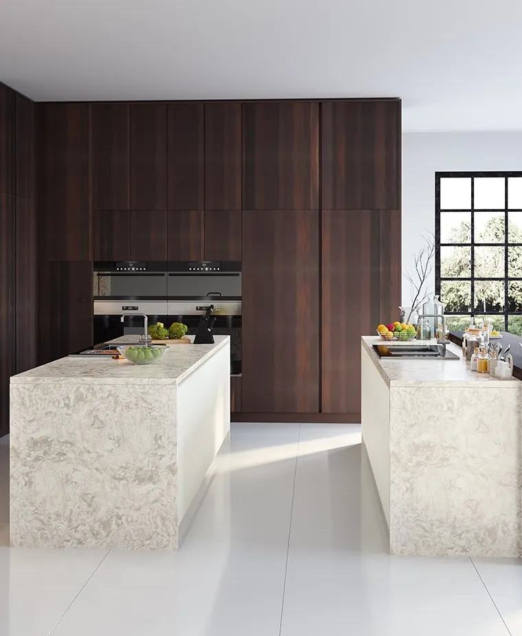 Kitchen with twin stone islands and dark walnut tall cabinets