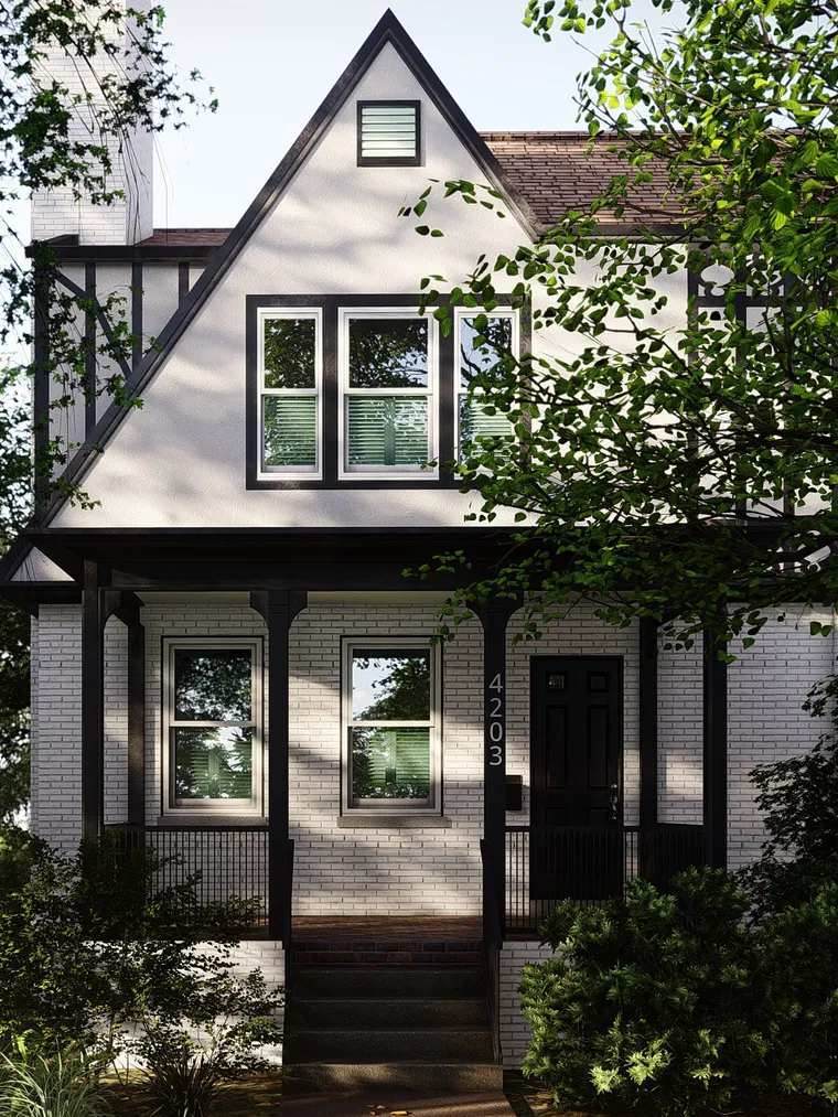 Tudor-style home with white stucco, dark timber and a covered porch