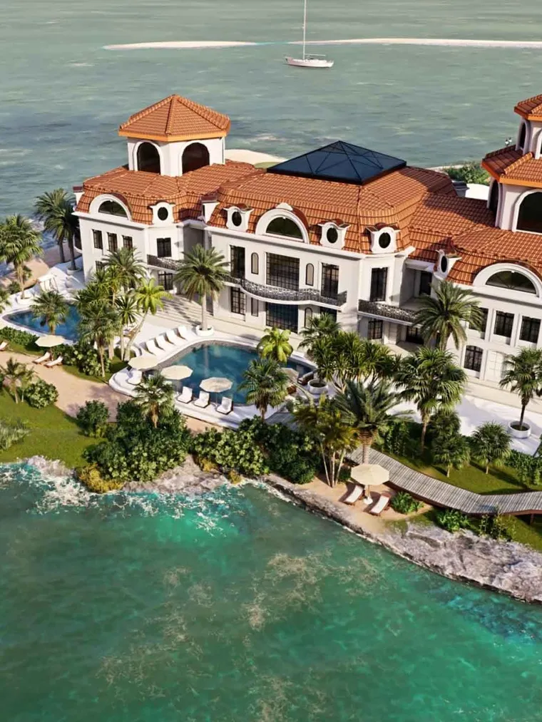 Aerial view of a Mediterranean villa on a turquoise coastline